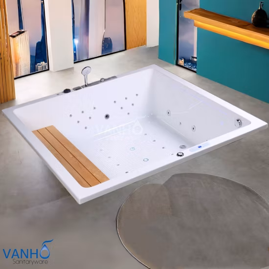 2つのサイドスカートと洗浄用のマッサージジェットを備えたアクリル製ハイドロマッサージ浴槽